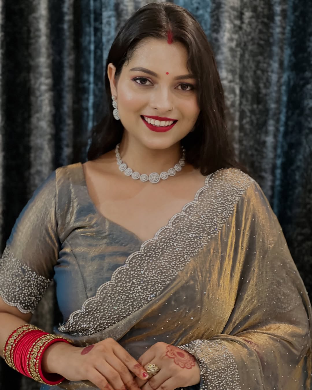 Delicately handcrafted Diamond work silk saree