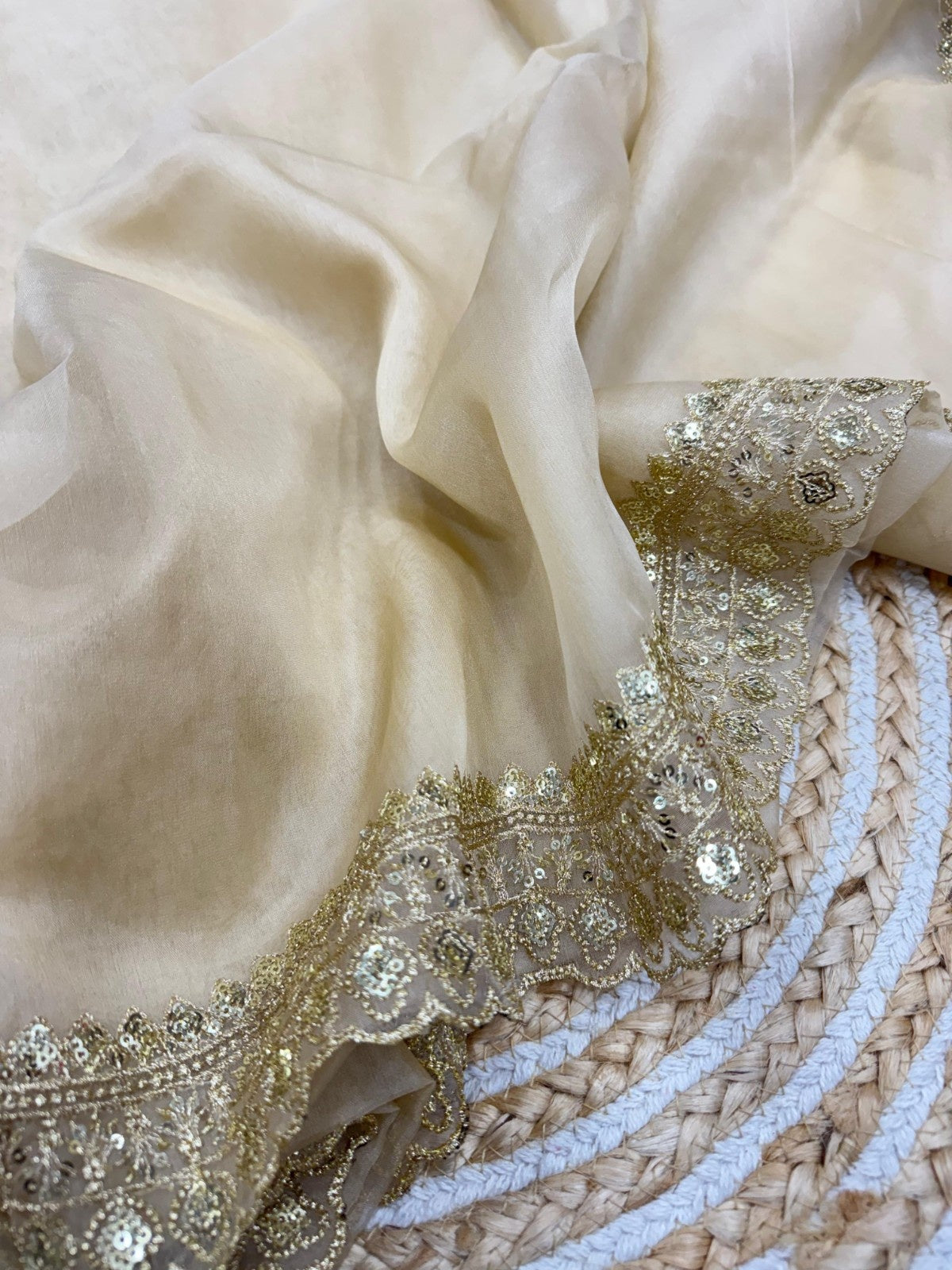 Regal Champagne Gold Saree with a Rich Red Corset Blouse