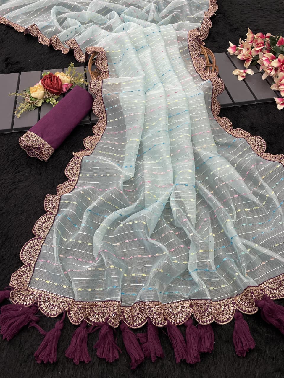 Luxurious Tissue Net Saree with Contrast Blouse