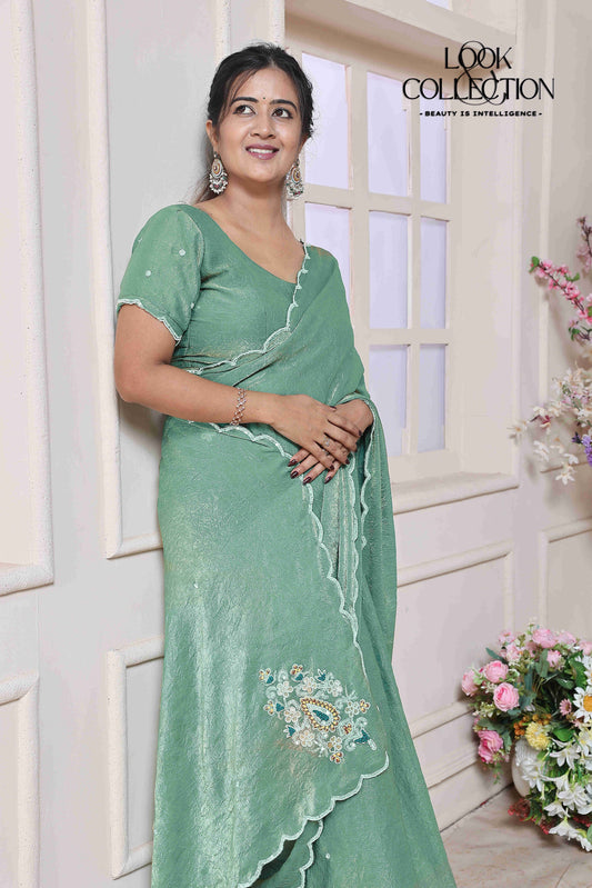 Presenting Light Green Full Handowrk saree On Fandy Crush Fabric