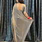 Delicately handcrafted Diamond work silk saree