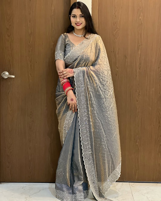 Delicately handcrafted Diamond work silk saree