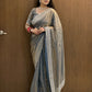 Delicately handcrafted Diamond work silk saree