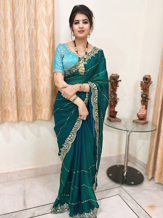 Soft And Elegant Fendy Sartin Fabric Saree With Beautiful Stiched Blouse