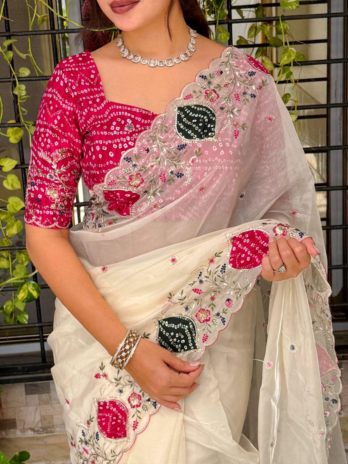 Pastel Perfection Crystal Tissue Saree with Zari Embroidery & Hand Applique Work