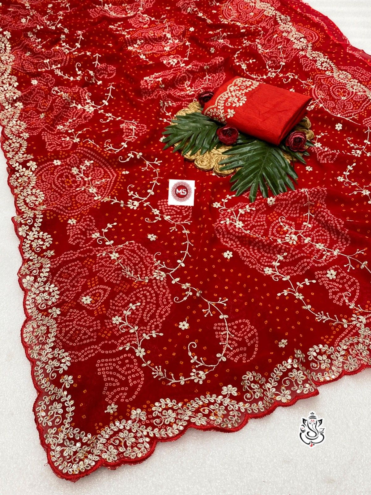 Exclusive C by C Bandhej Print Saree with Zari Embroidery & Cutwork Border