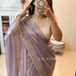 Delicately handcrafted Diamond work bring out the vibrancy of this pink silk saree.