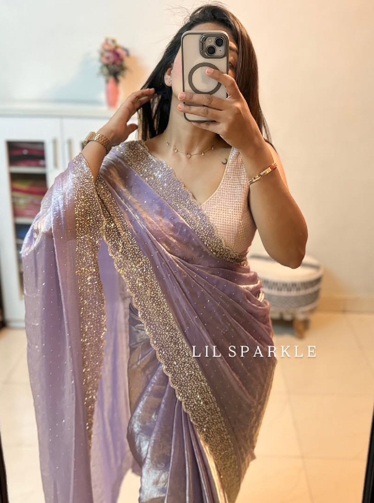 Delicately handcrafted Diamond work bring out the vibrancy of this pink silk saree.